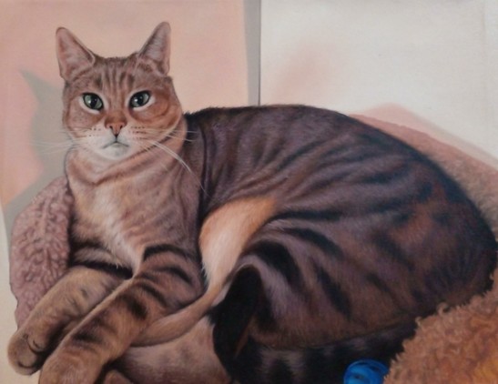 a painting of a tan and brown stripped cat, laying in a bed, a blue ball next to it, it is looking at the viewer